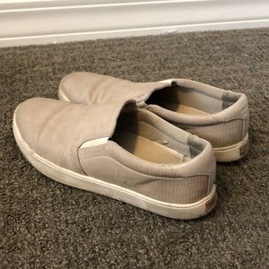Tan snake skin slip on sneakers